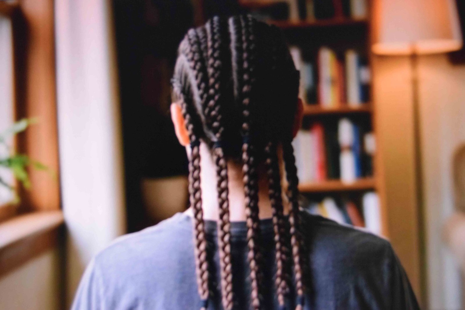 Braids secured with a band at the scalp and another at each tip
