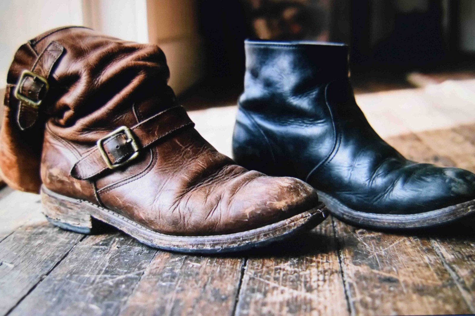 A folded over knee high boot compared with a plain ankle boot