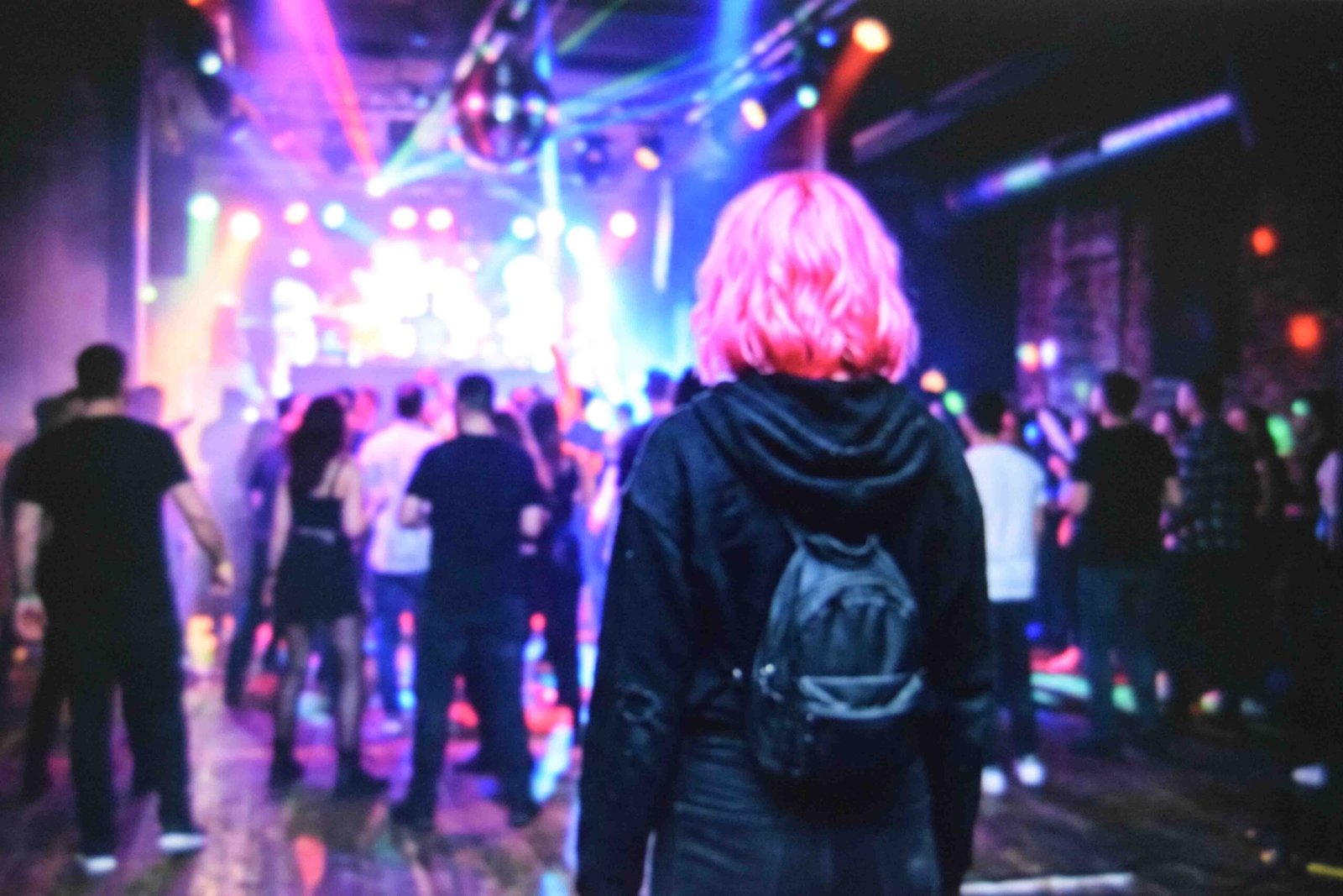 A bubblegum pink wig worn with all black so the hair carries the whole look