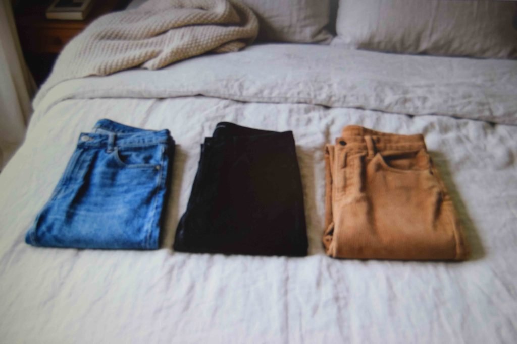 Three pairs of pants compared before choosing which ones to decorate for senior year