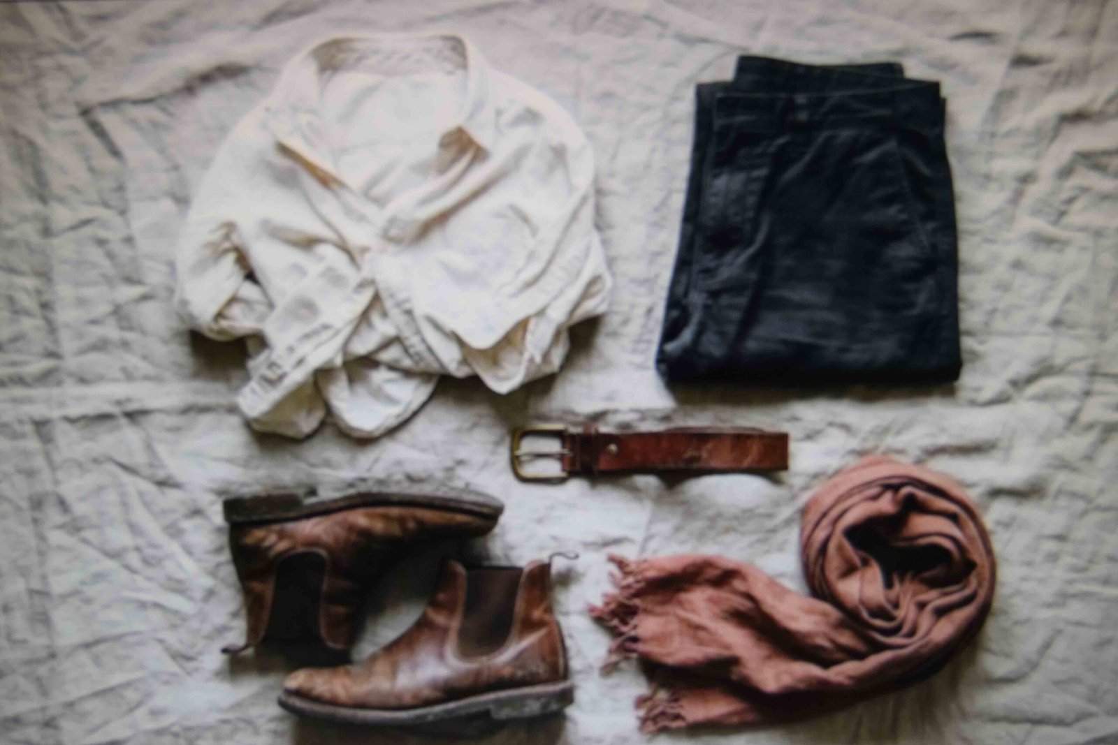 Wardrobe pieces laid out before deciding what still needs buying