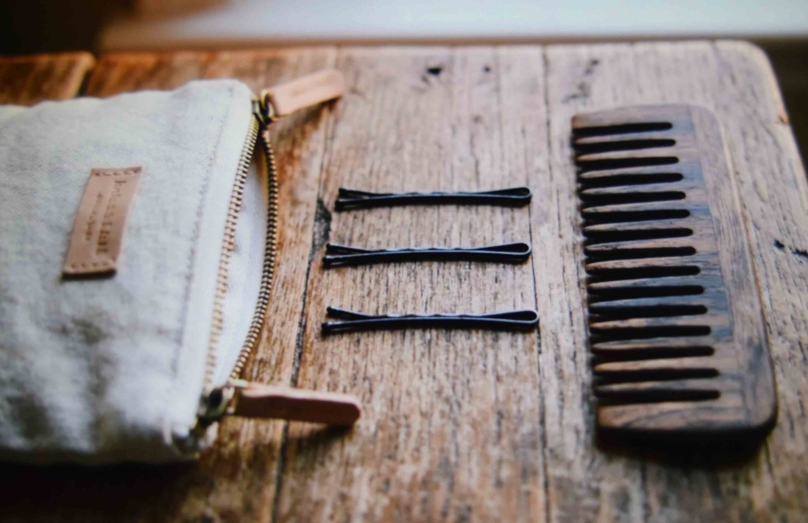 Bobby pins and a wide tooth comb kept on hand for the evening