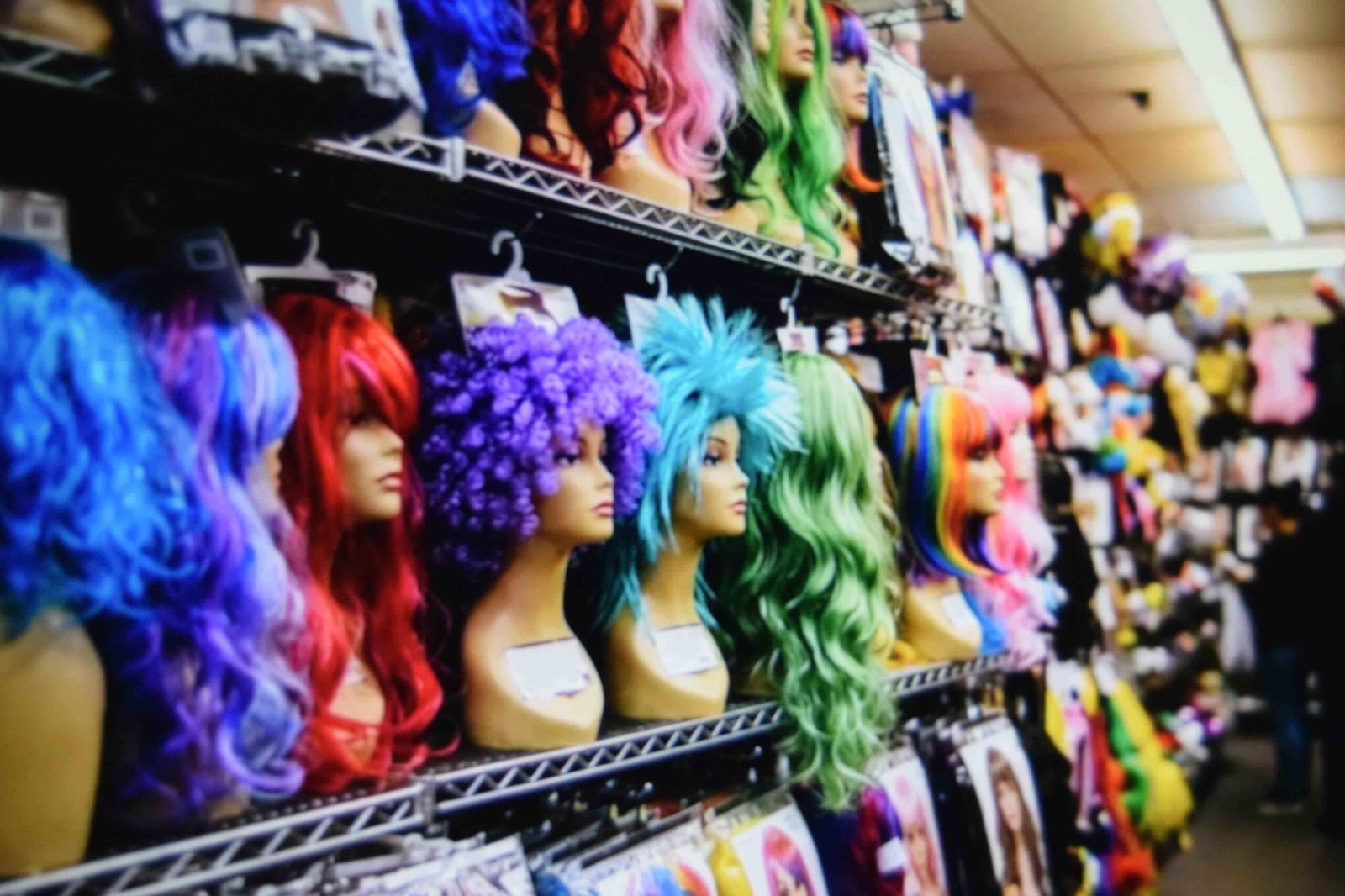 A party shop wig shelf as a last minute halloween costume idea source