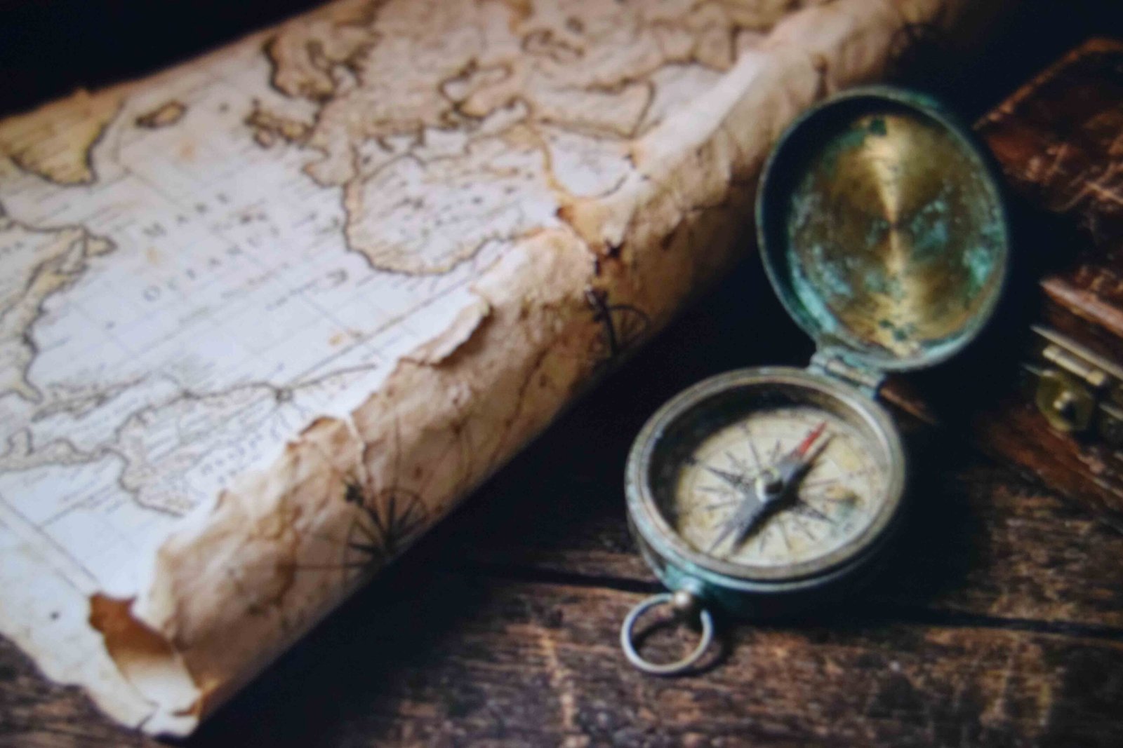 A rolled map compass and small box as props that avoid weapon rules