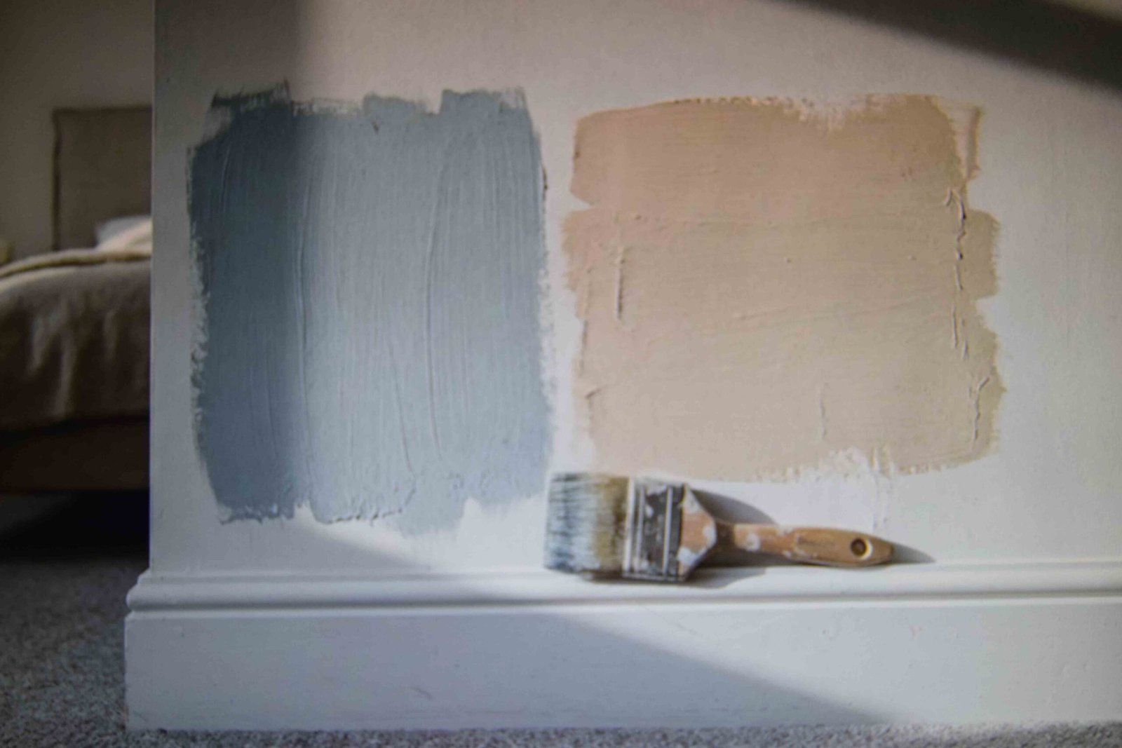 Cool and warm paint samples tested on the wall when decorating a master bedroom