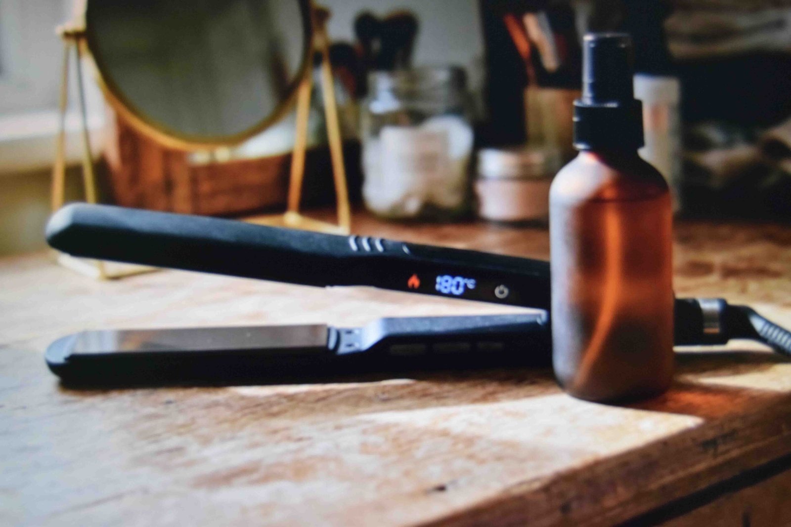 Setting a lower heat styling temperature to protect hair while growing it out