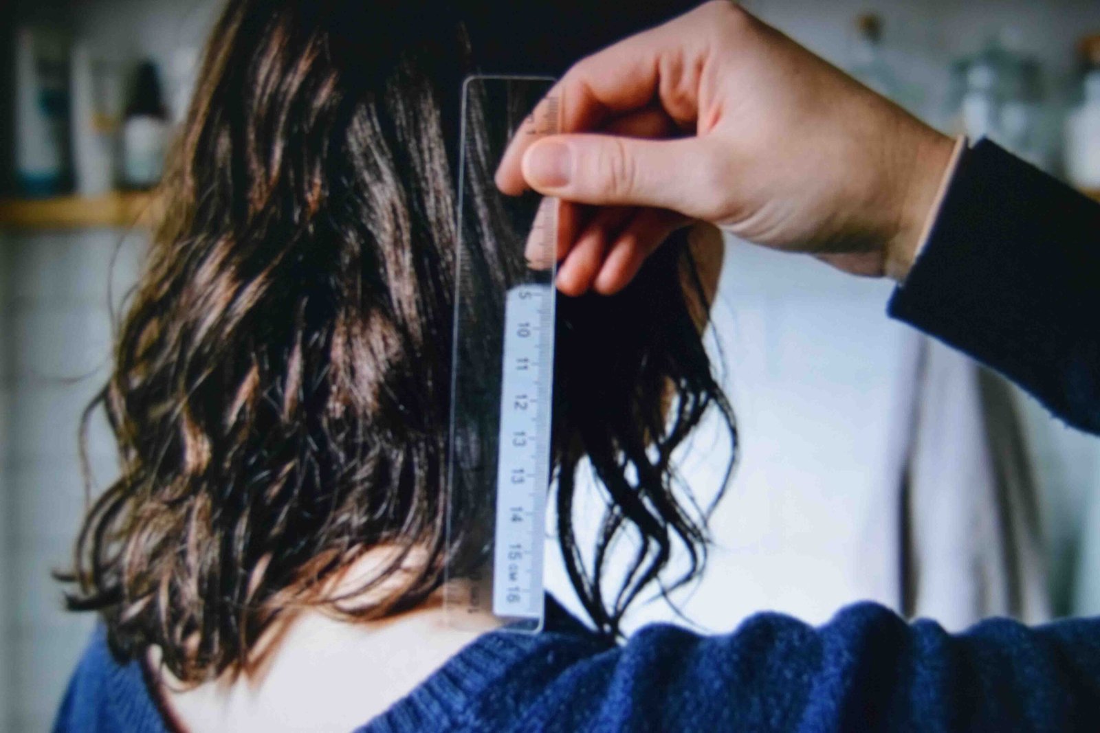Measuring hair length to see how long it takes for your hair to grow noticeably