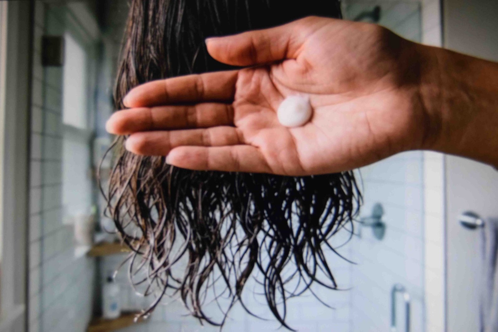 The right leave-in amount showing how to make hair thicker without buildup