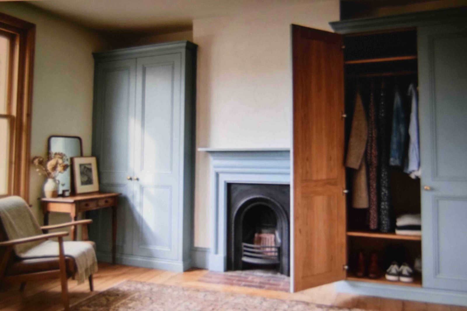 Alcove wardrobes built beside a chimney breast as practical master bedroom built in ideas