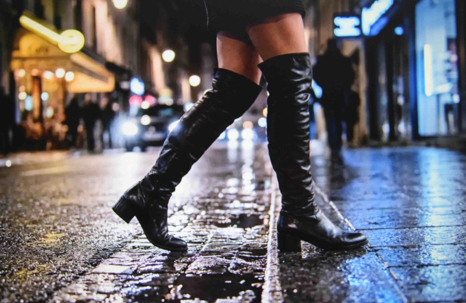 Thigh high boots worn with the correct hem gap for a night out