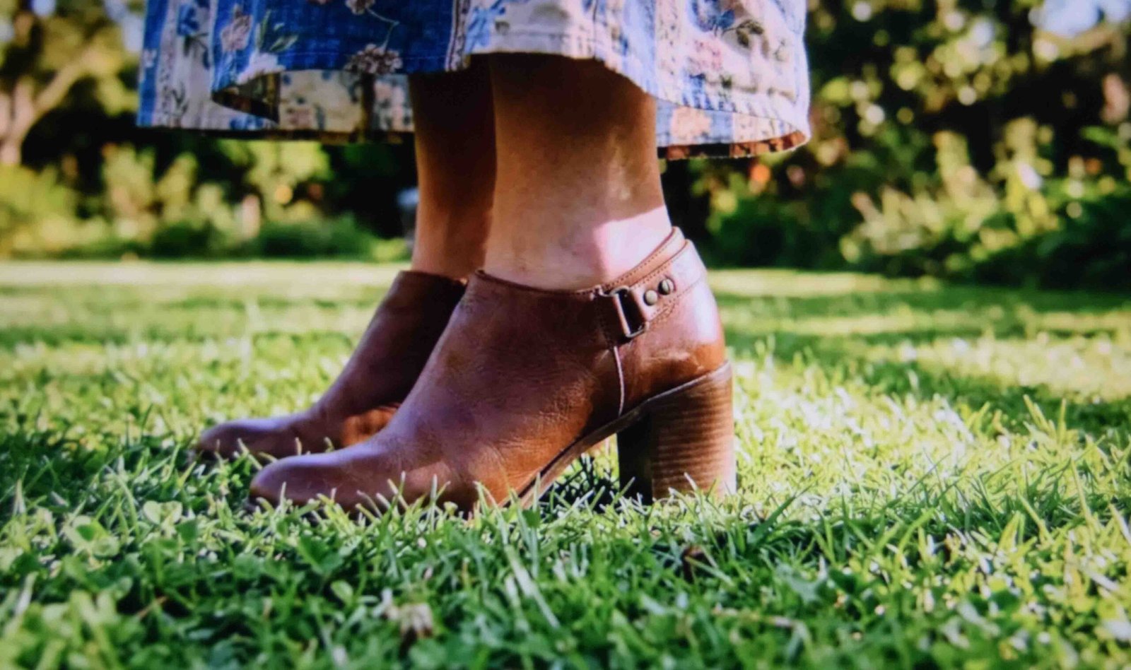 Block heels standing level on grass instead of sinking like a stiletto